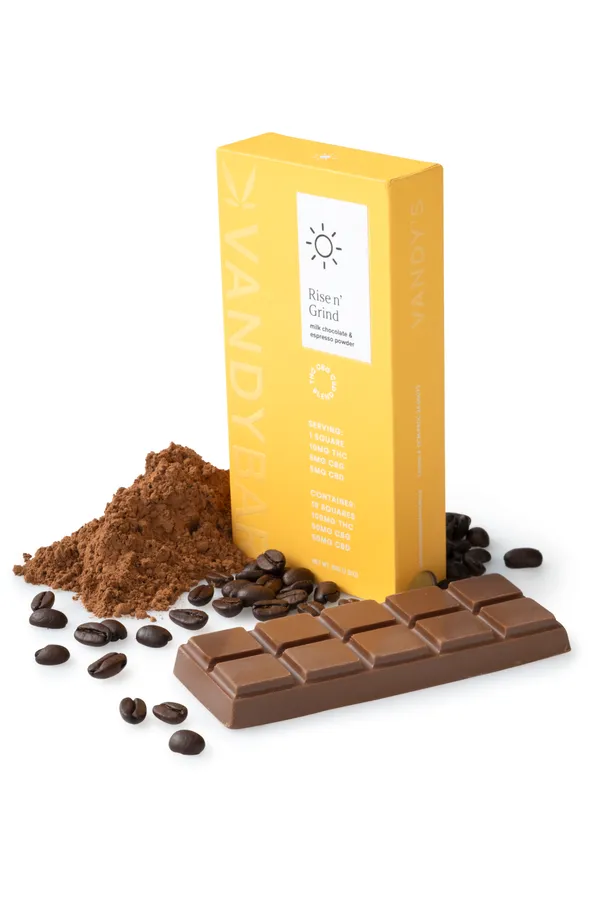Rise n' Grind VandyBar box in yellow with a milk chocolate bar, espresso beans and cocoa powder. The box lists 10mg THC, 5mg CBG and 5mg CBD per square.